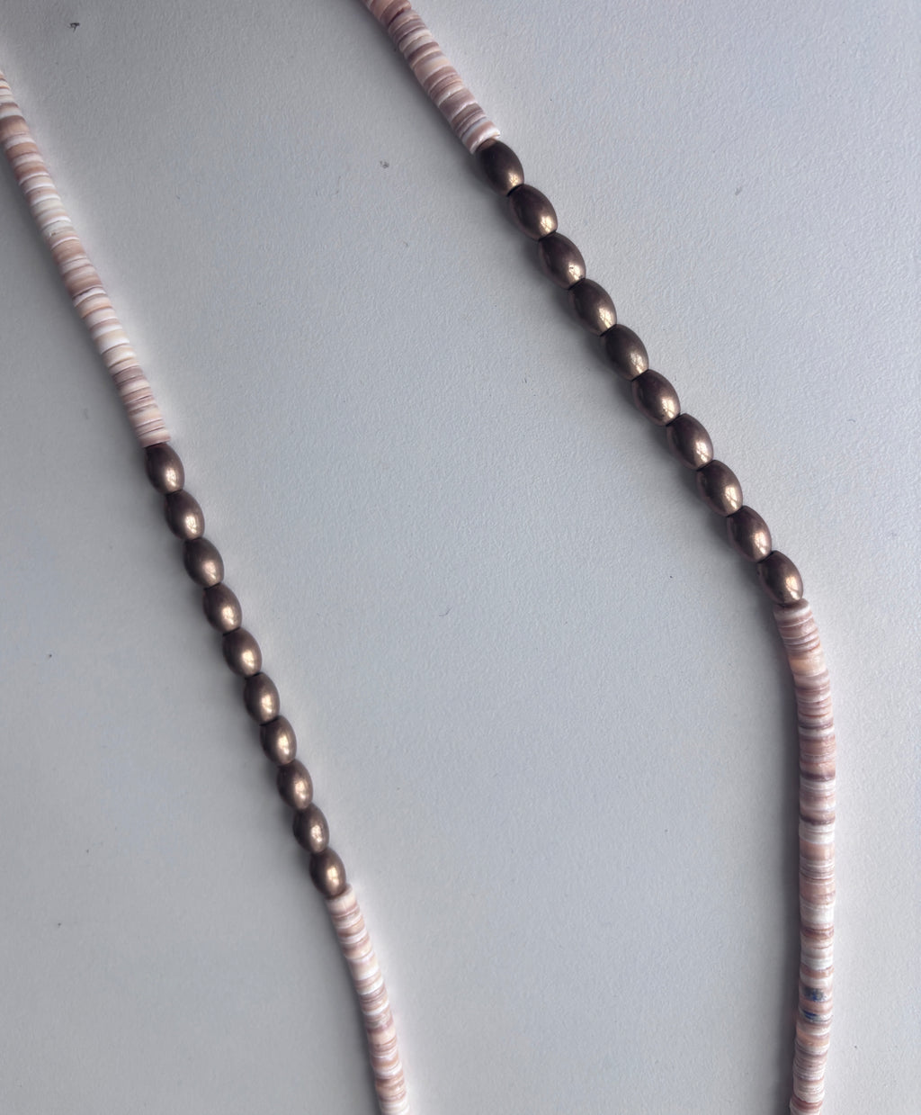 sɬk̓ʷaɬq̓ʷlt  plateau-style necklace
